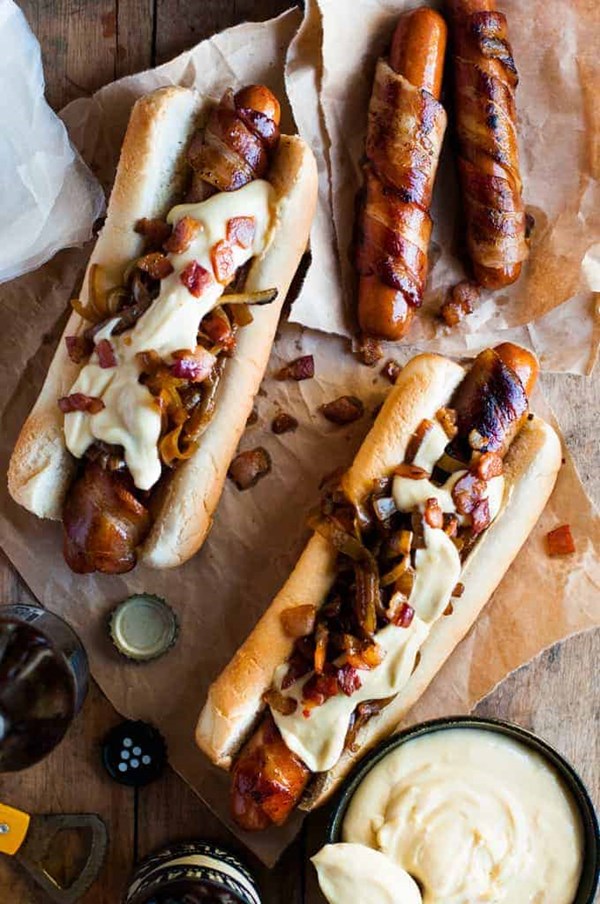 Bacon wrapped hot dogs with cheese sauce