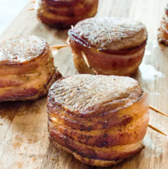 Bacon-wrapped pork tenderloin medallions