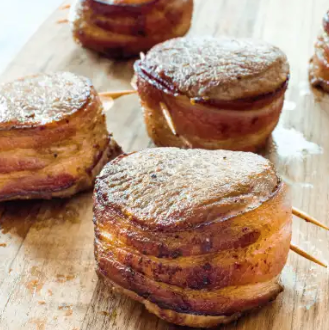 Bacon-wrapped pork tenderloin medallions