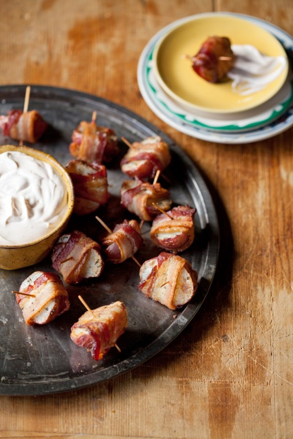 Bacon-wrapped potato bites with spicy sour cream dipping sauce