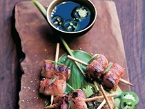 Bacon-wrapped rice cakes with a jalapeño ponzu