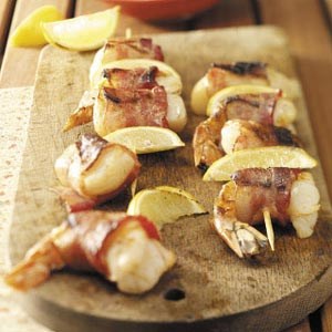 Bacon-wrapped seafood skewers 