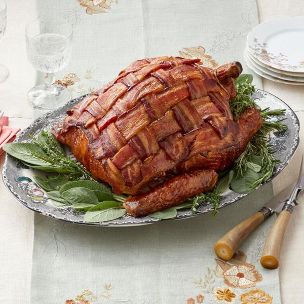 Bacon-wrapped turkey with garlic butter