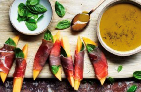 Bagna cauda with rockmelon wrapped in prosciutto