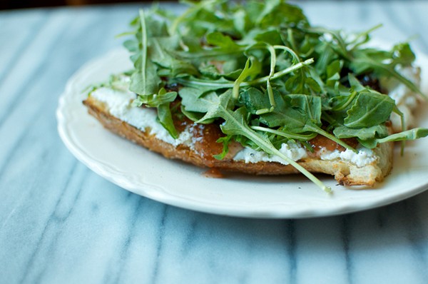 Baguette with ricotta, fig jam, and baby arugula