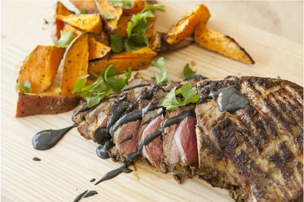 Baharat & lemon roast lamb with black sesame sauce [Anna Hansen]