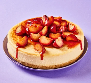 Baked almond cheesecake with Earl Grey plums