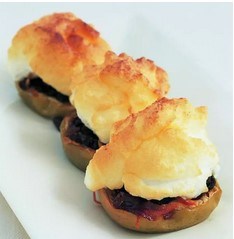 Baked apple meringues with orange-soaked raisins