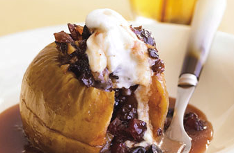 Baked apples with mincemeat, cherries, and walnuts