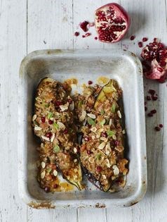 Baked aubergine with spiced lamb, mint and pomegranate