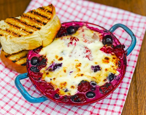 Baked berries with brandy & mascarpone