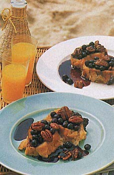 Baked blueberry-pecan French toast with blueberry syrup