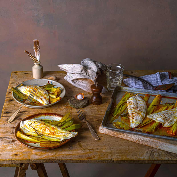 Baked brill with leeks, lemon and thyme