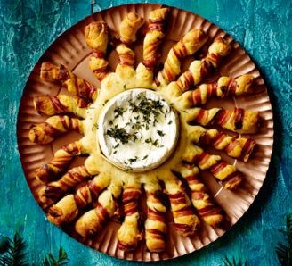 Baked Camembert with bacon-wrapped breadsticks