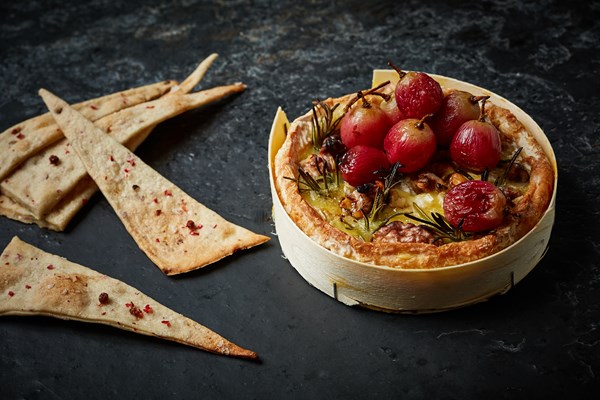 Baked Camembert with roasted grapes, walnuts, rosemary and pink peppercorn crackers
