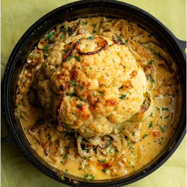 Baked cauliflower with onions and cheddar