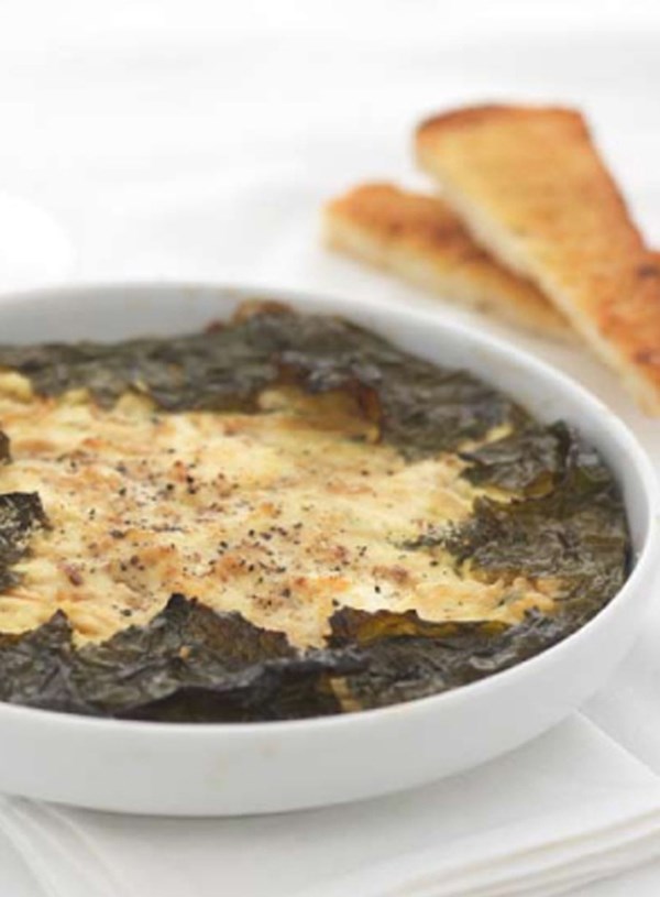 Baked cheese in vine leaves