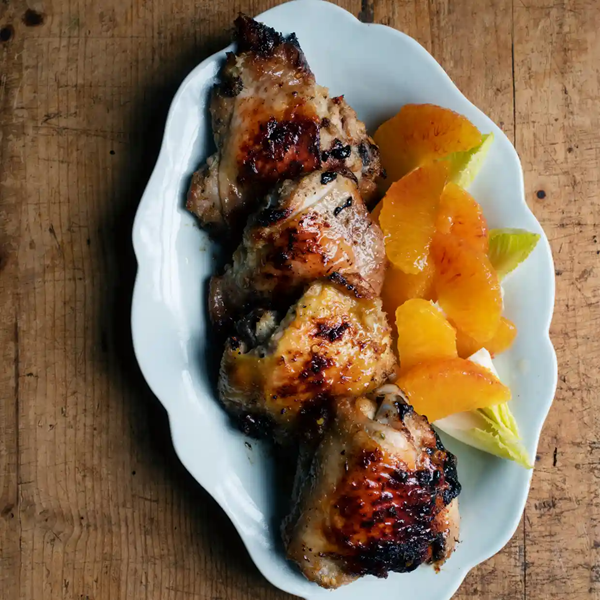 Baked chicken thighs, orange and chicory