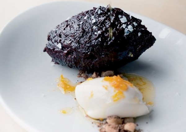 Baked chocolate ganache with spicy hazelnuts and orange oil