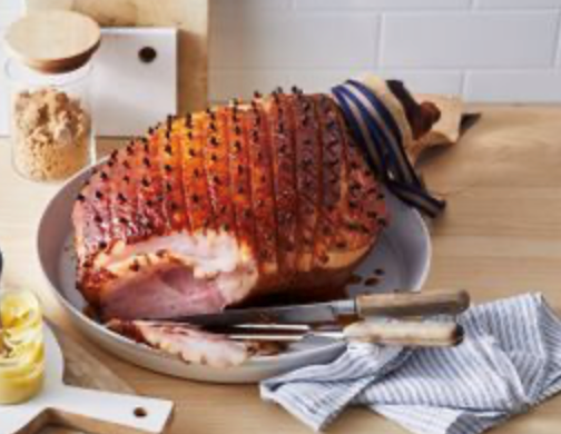 Baked Christmas ham with maple syrup and clove glaze