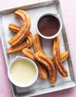 Baked churros with chocolate sauce