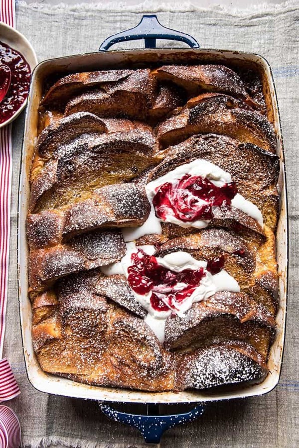 Baked cinnamon crème brûlée French toast with raspberry preserves