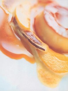 Baked coconut cream with caramelized fruits and rum sabayon