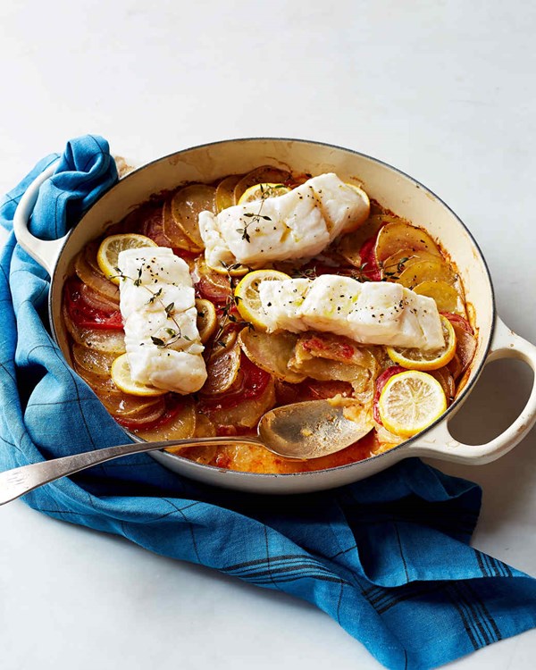 Baked cod with tomatoes and potatoes