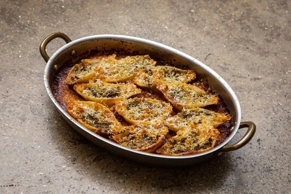 Baked conchiglioni stuffed with brooocli and anchovy and tomato sauce