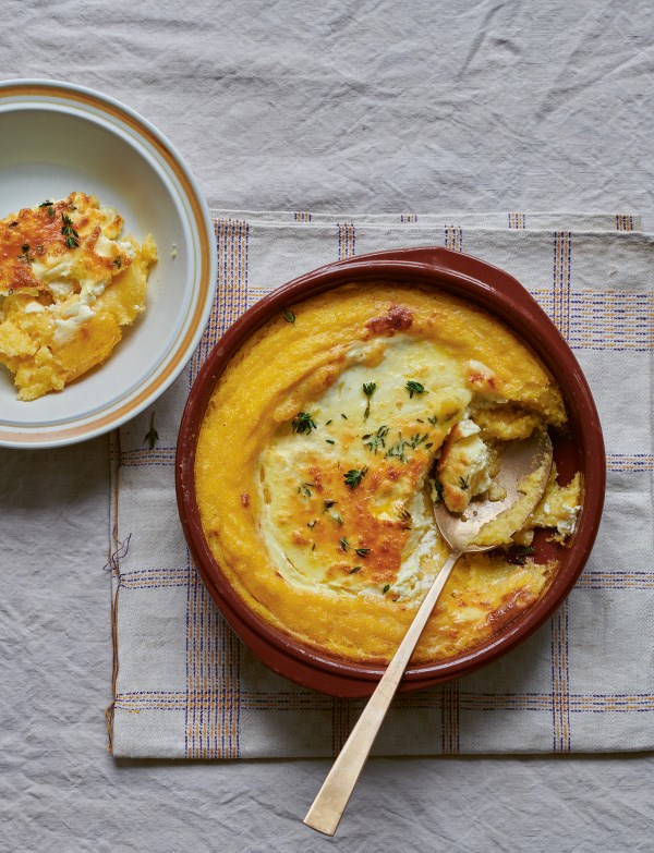Baked cornmeal with sour cream, cheese and eggs (Mǎmǎligǎ la cuptor)