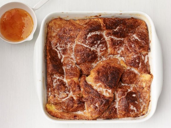 Baked croissant French toast with orange syrup 