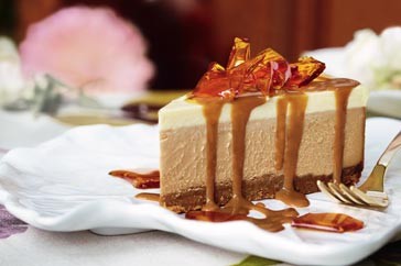 Baked dulce de leche cheesecake with toffee shards