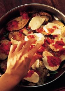Baked eggplant with tomato, mozzarella and Parmesan cheese (Melanzane alla Parmigiana)