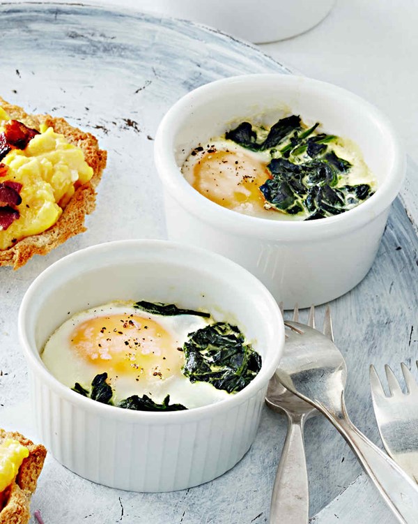 Baked eggs and creamy greens