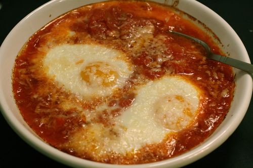 Baked eggs in tomato-Parmesan sauce