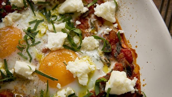 Baked eggs, spiced tomato and feta