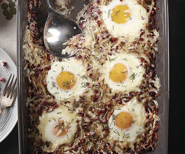 Baked eggs with corned beef and sauerkraut hash
