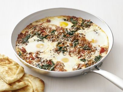 Baked eggs with curried spinach