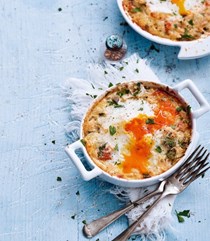 Baked eggs with hot-smoked salmon and herbs