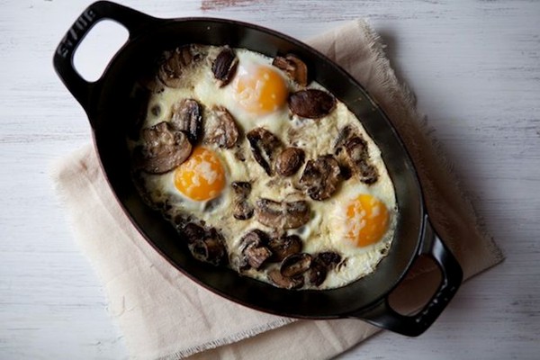 Baked eggs with mushrooms and Gruyere