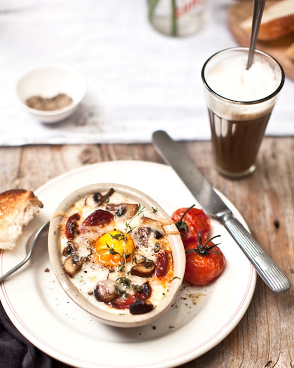 Baked eggs with spinach, mushrooms, goat’s cheese and chorizo