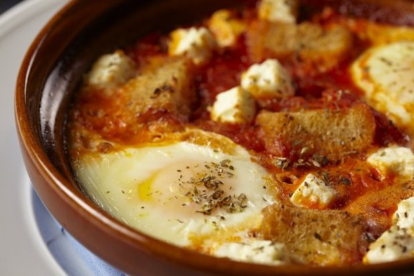 Baked eggs with tomato and feta