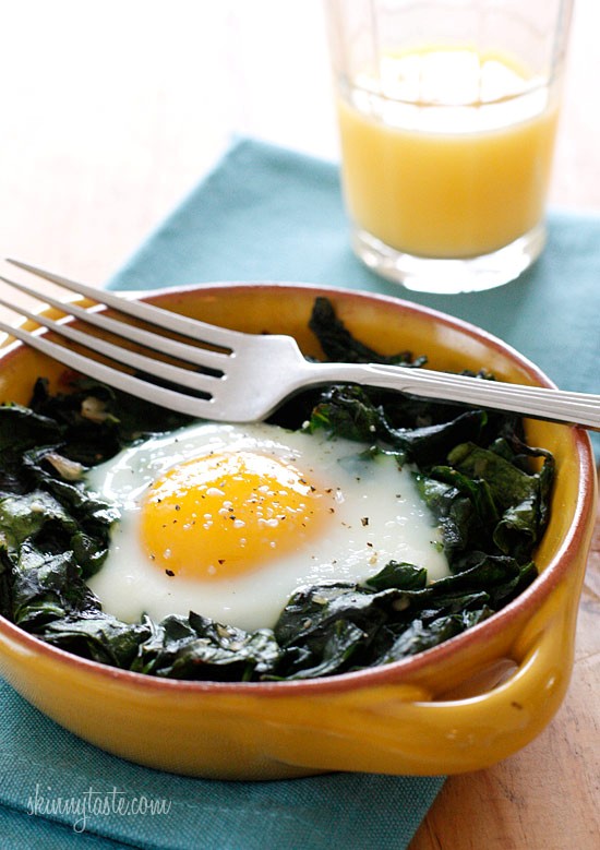 Baked eggs with wilted baby spinach