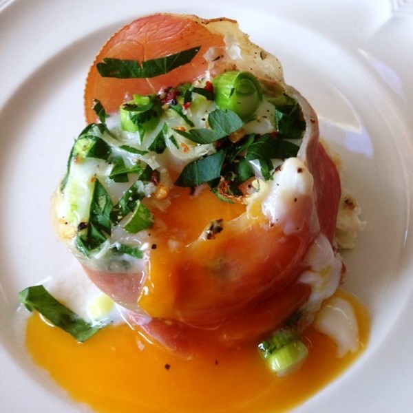 Baked eggs wrapped in prosciutto