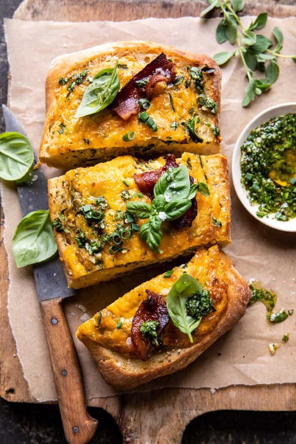 Baked everything cheddar egg boats with pesto