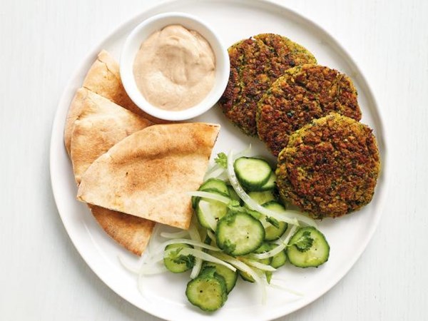 Baked falafel with cucumbers and tahini