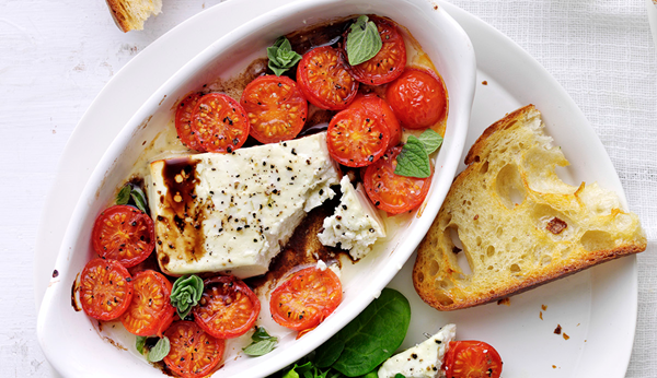 Baked feta with cherry tomatoes and garlic toast