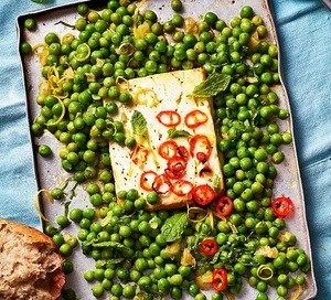 Baked feta with peas, chilli & preserved lemon