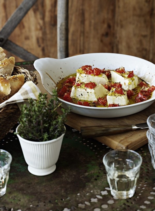 Baked feta with tomatoes, oregano and lemon