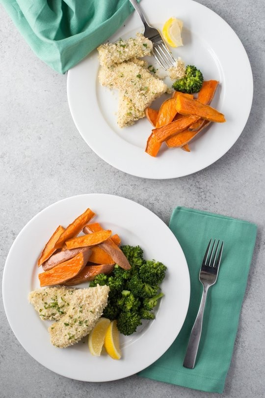 Baked fish fingers and sweet potato wedges